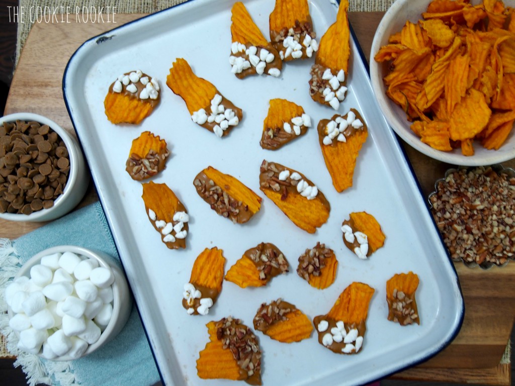 sweet potato chips dipped in cinnamon white chocolate and topped with marshmallows and pecans! my favorite side dish in snack form! loaded sweet potato chips!