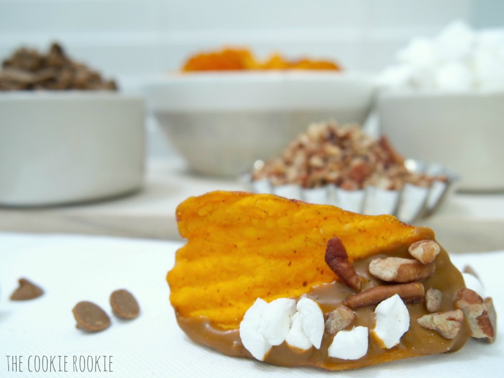 sweet potato chips dipped in cinnamon white chocolate and topped with marshmallows and pecans! my favorite side dish in snack form! loaded sweet potato chips!