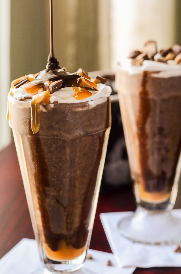 Boozy Caramel Peanut Butter Cup Milkshakes | Chocolate, caramel, peanut butter overload! Get the recipe on MyCookingSpot.com!
