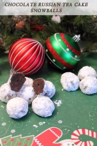 Chocolate Russian Tea Cake Snowballs 2 - Fun & simple to make, these snowballs are chock full of chocolate and chocolate chips then covered with powdered sugar. Perfect for the holidays!
