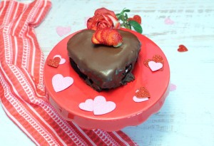 Chocolate Lovers Cake A rich devil's food cake filled with strawberry cheesecake and topped with a dark chocolate ganache. Perfect for a lovers treat!