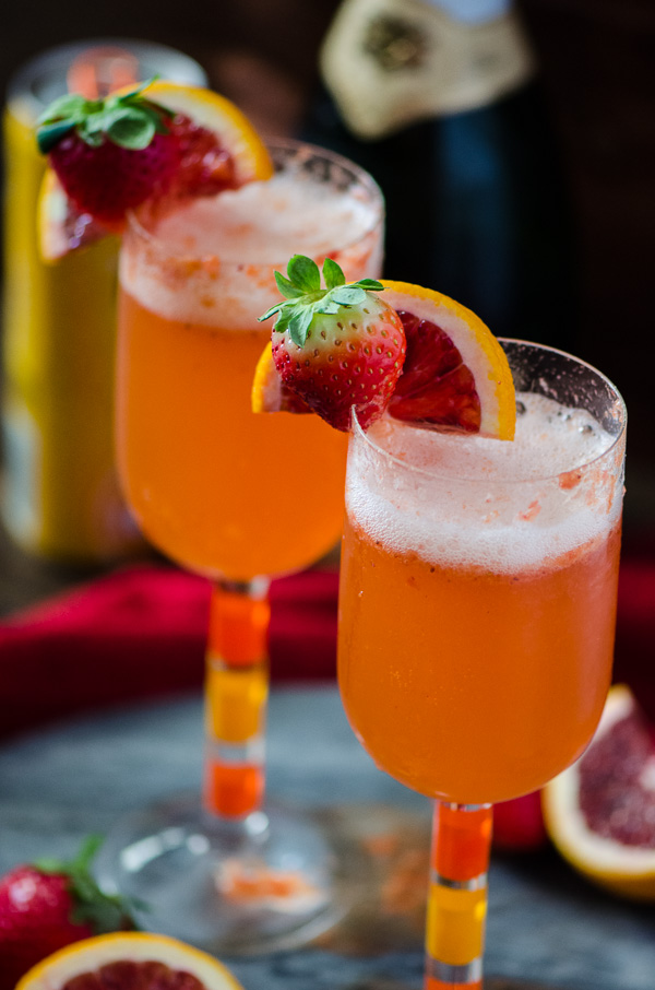 Strawberry Blood Orange Mimosas - A sweet, romantic twist on a classic mimosa. | Get the recipe on MyCookingSpot.com!