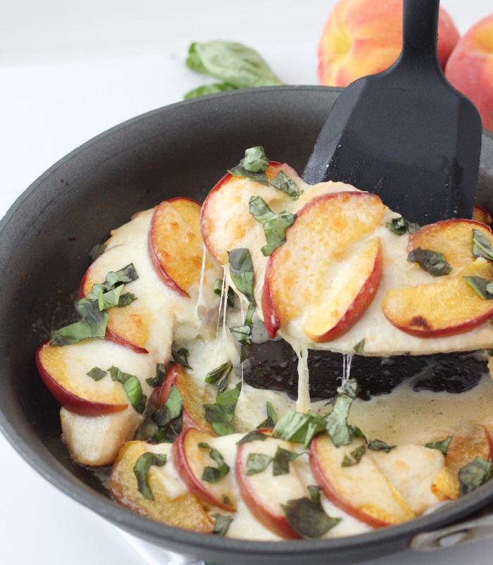 Peaches and mozzarella take chicken from boring to delicious in this easy one-skillet dish ~ Balsamic Roasted Peach Chicken from @memeinge 